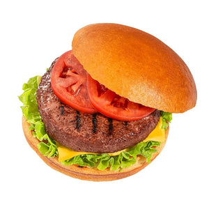 Plant-based burger with lettuce, tomato, cheese, and bun from iPlantBased UAE