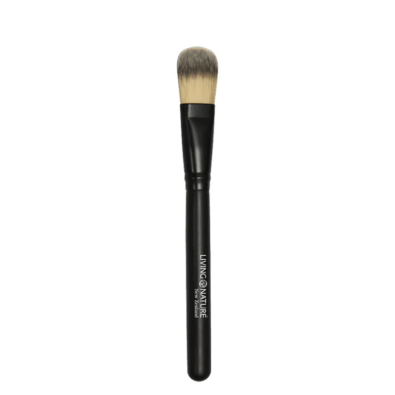 Black foundation brush packaging with 'Living Nature'