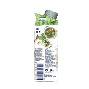 Back of Alpro plant-based milk carton with salad images and contact info, iPlantBased UAE