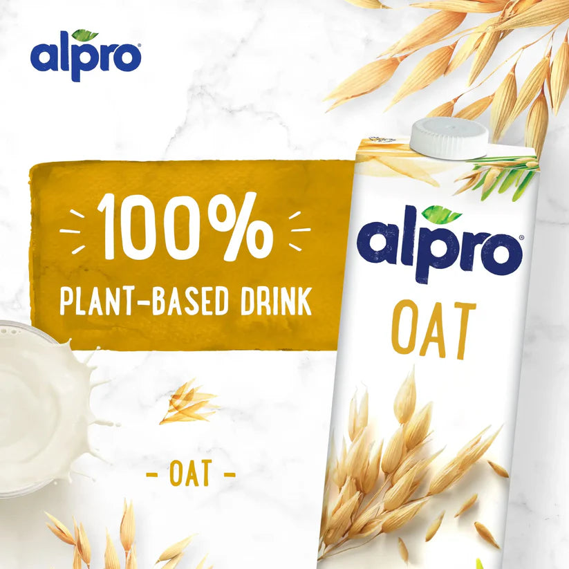 Alpro oat milk carton with oats, labeled 100% plant-based drink, vegan beverage in UAE