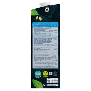 Back of plant-based soy milk carton with nutrition facts, vegan and eco-friendly labels, green leaf, from iPlantBased UAE.