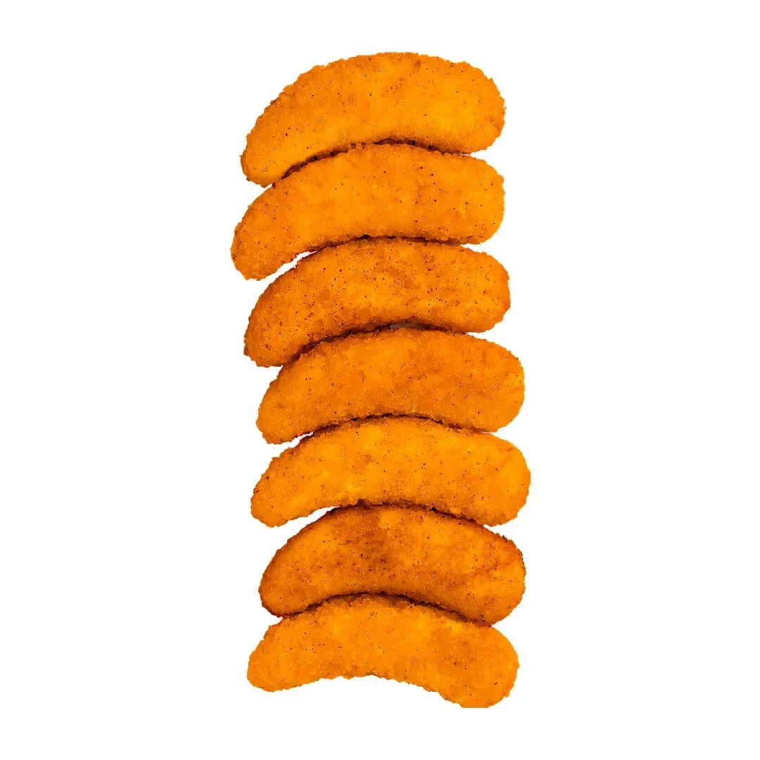 Crispy breaded plant-based nuggets arranged on white background, iPlantBased UAE