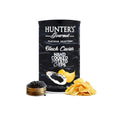Hunter’s Gourmet Black Caviar Hand Cooked Potato Chips with caviar tin and chips on white background