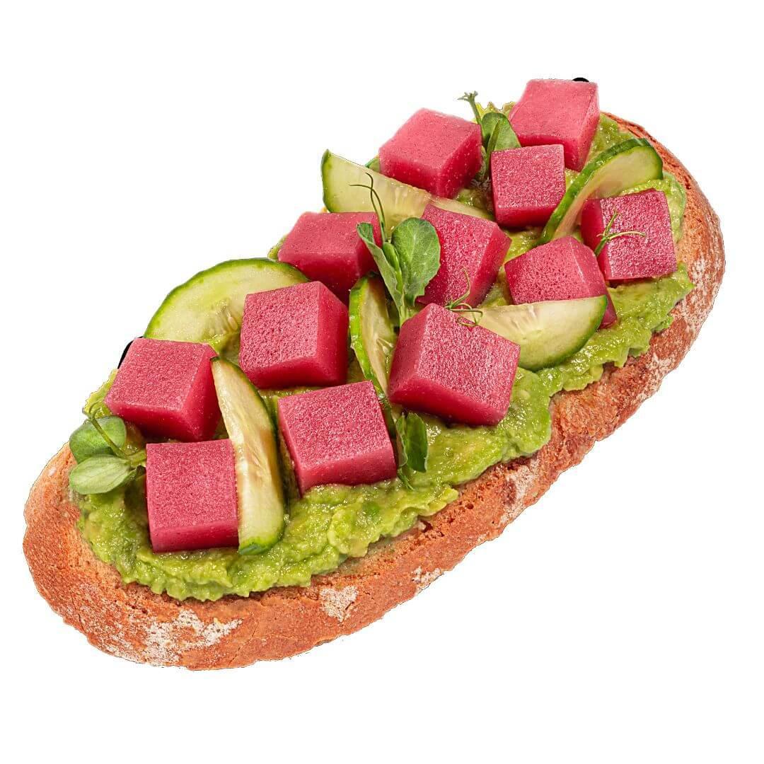 Plant-based sashimi cubes on avocado toast with cucumber, iPlantBased UAE vegan food