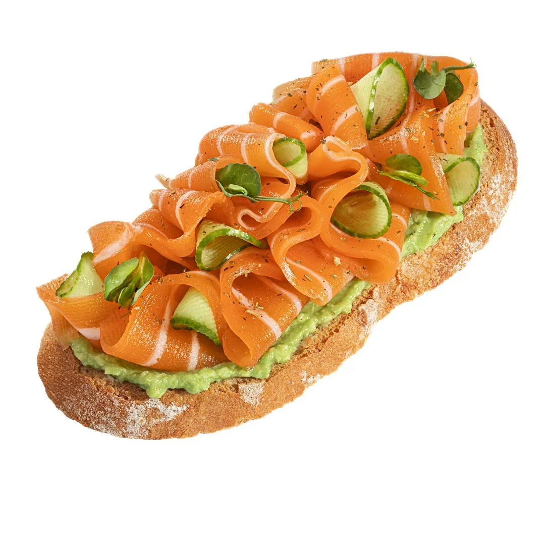 Plant-based smoked salmon and avocado toast on rustic bread, iPlantBased UAE vegan food