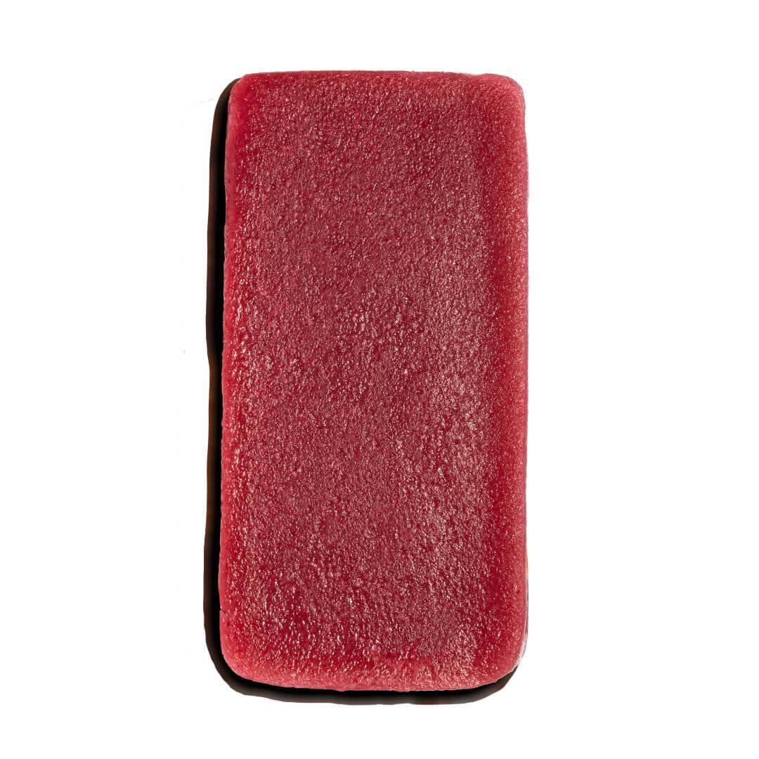 Rectangular plant-based vegan sashimi piece from iPlantBased, red color, isolated on white