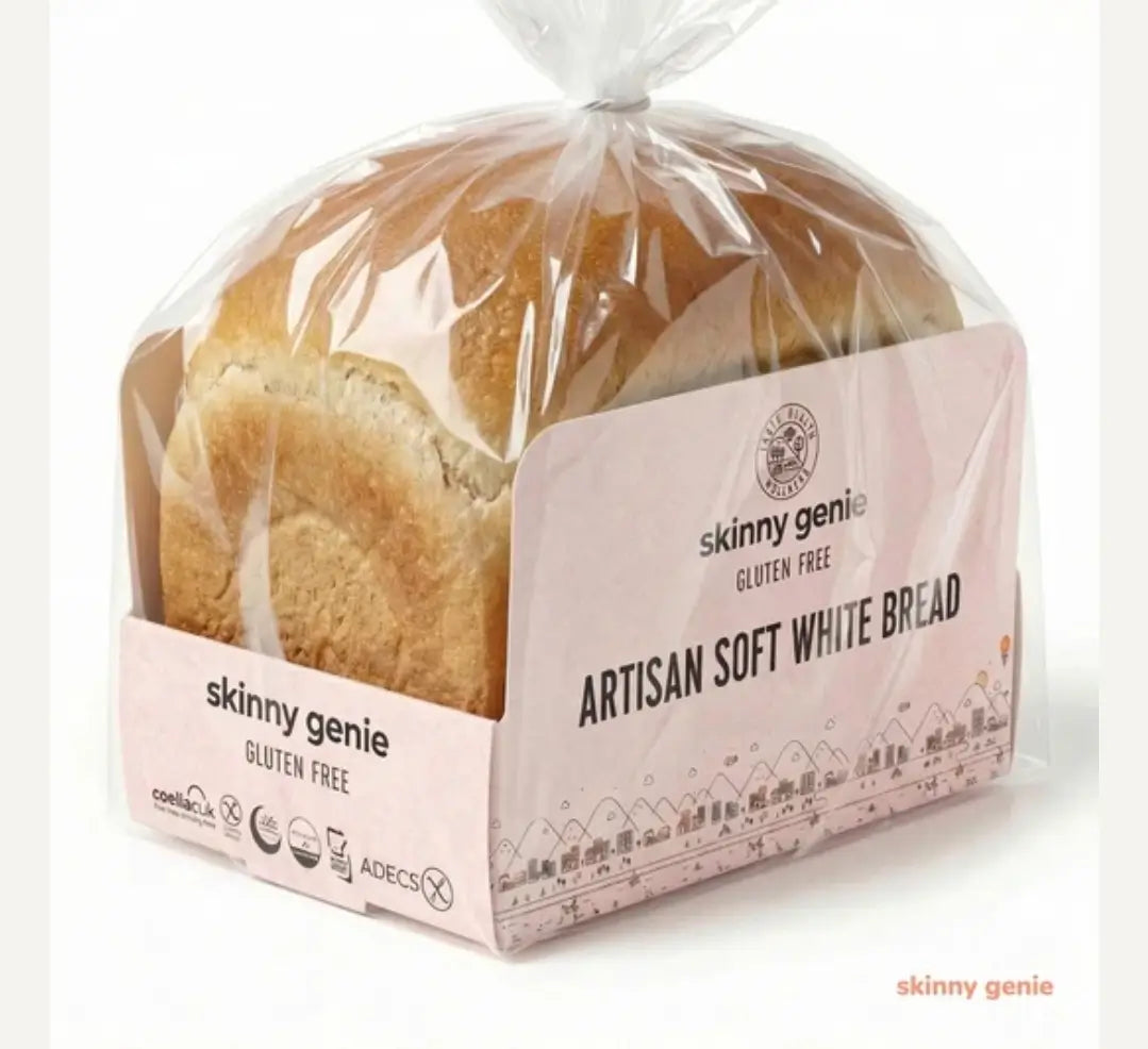 Packaged loaf of artisan soft white bread with 'skinny genie' branding on a white background