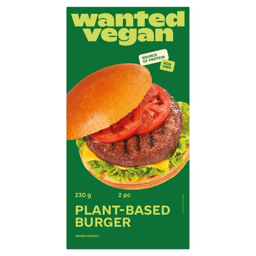 Wanted Vegan plant-based burger packaging with tomato, lettuce, and bun on green background