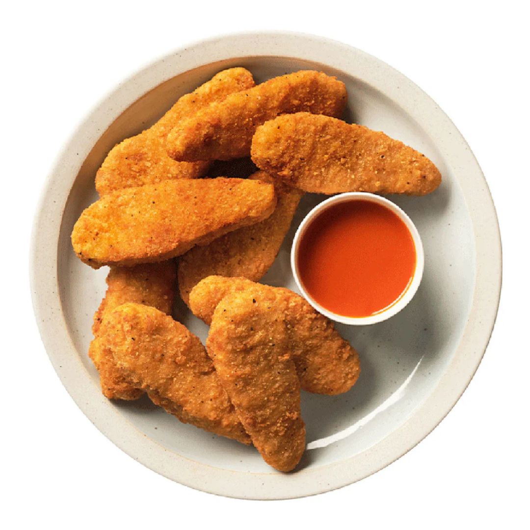 Plate of plant-based nuggets with dipping sauce from iPlantBased UAE