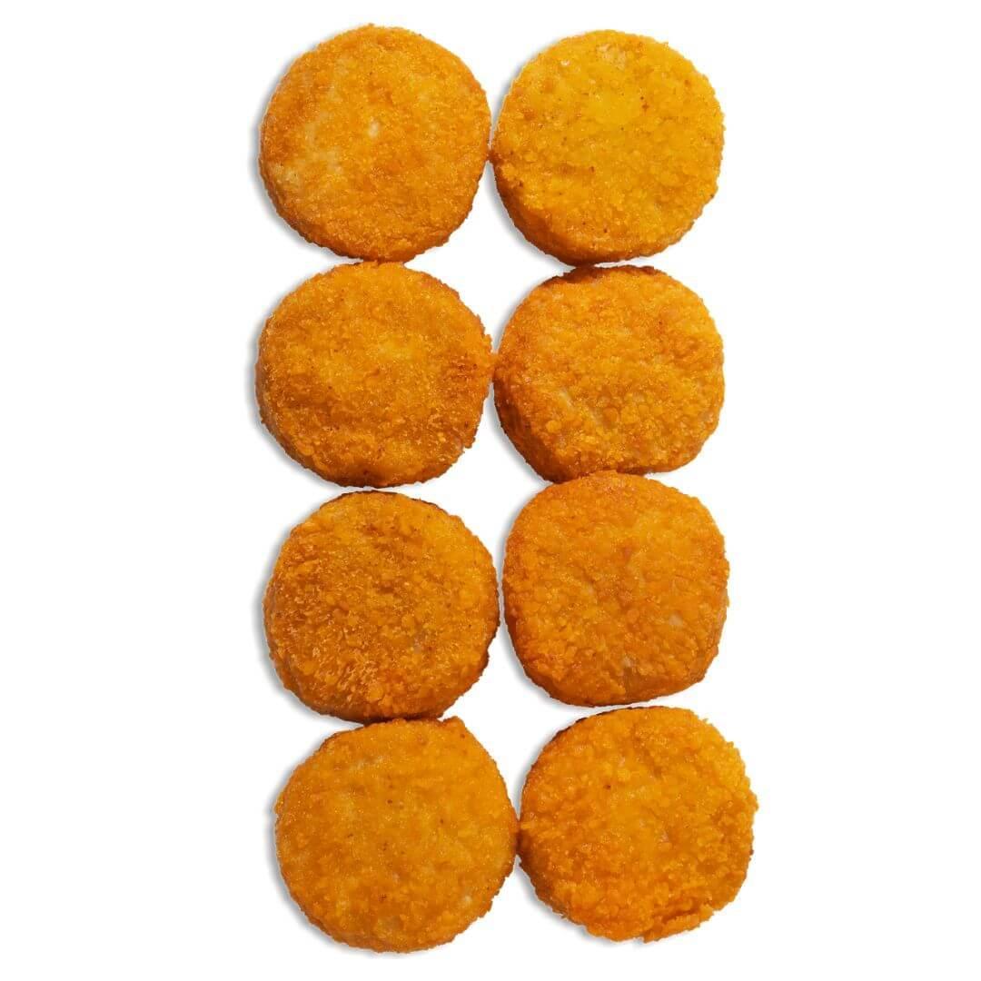 Eight breaded plant-based nuggets on white background, iPlantBased vegan food UAE