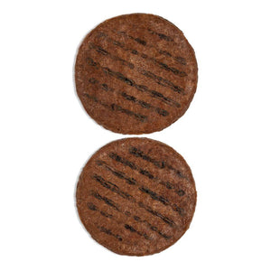 Two plant-based burger patties with grill marks on a white background from iPlantBased UAE.